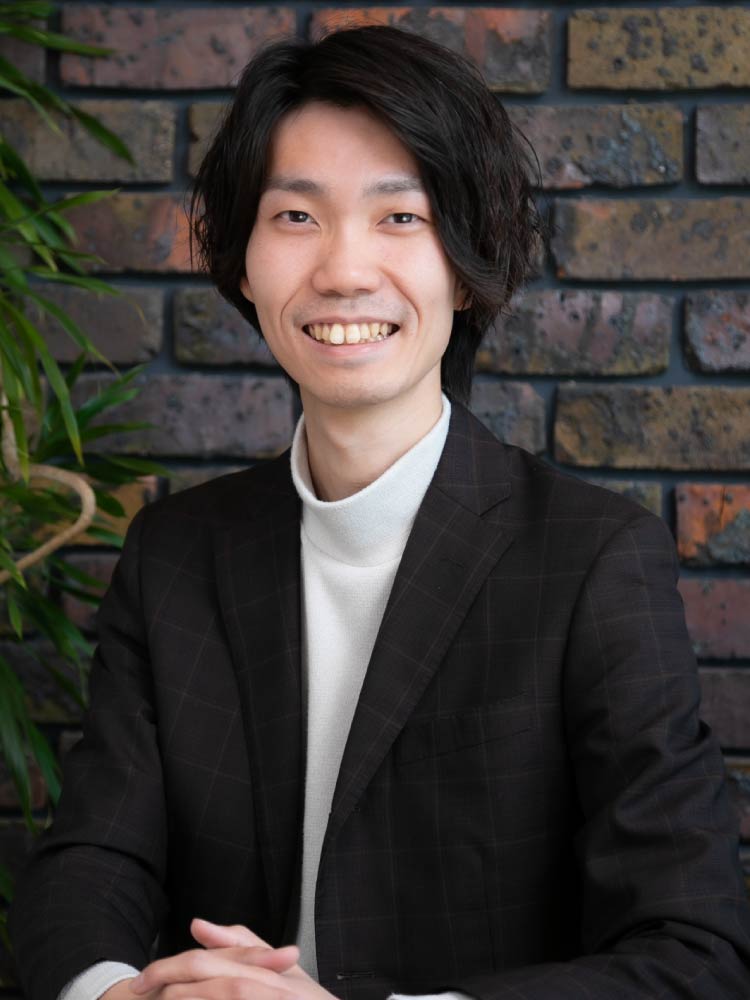 T.Negishi